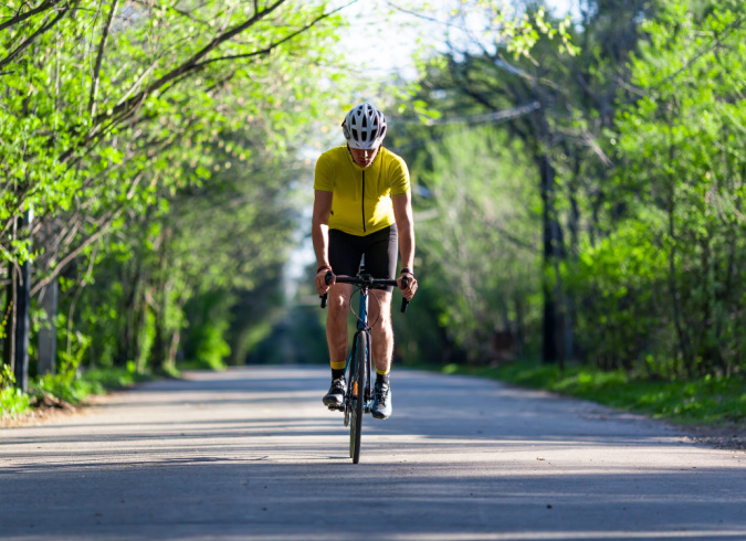 Charlesbank Apartment Homes - Watertown, MA - biker on trail