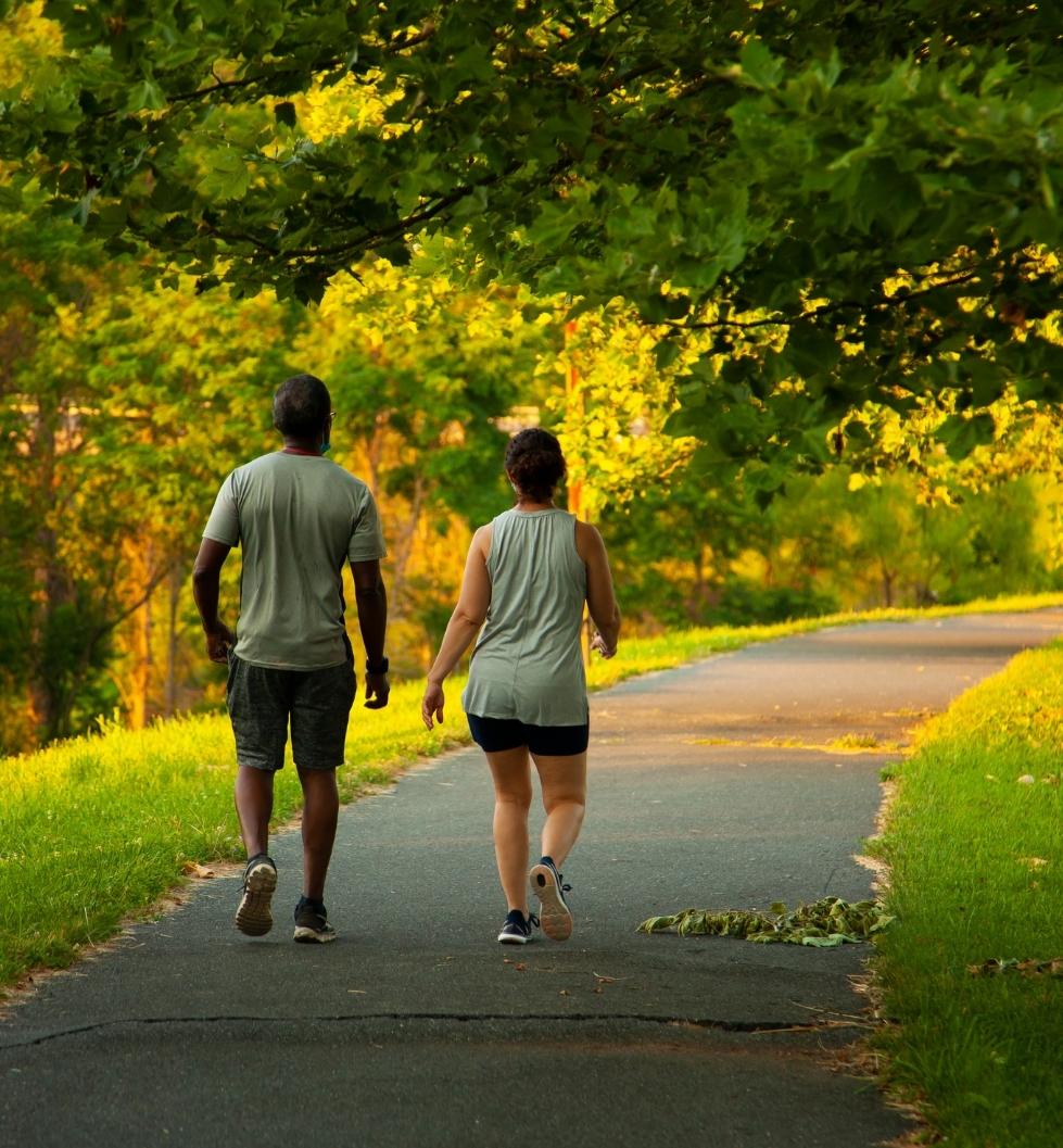 Charlesbank Apartment Homes - Watertown, MA -People walking in a park